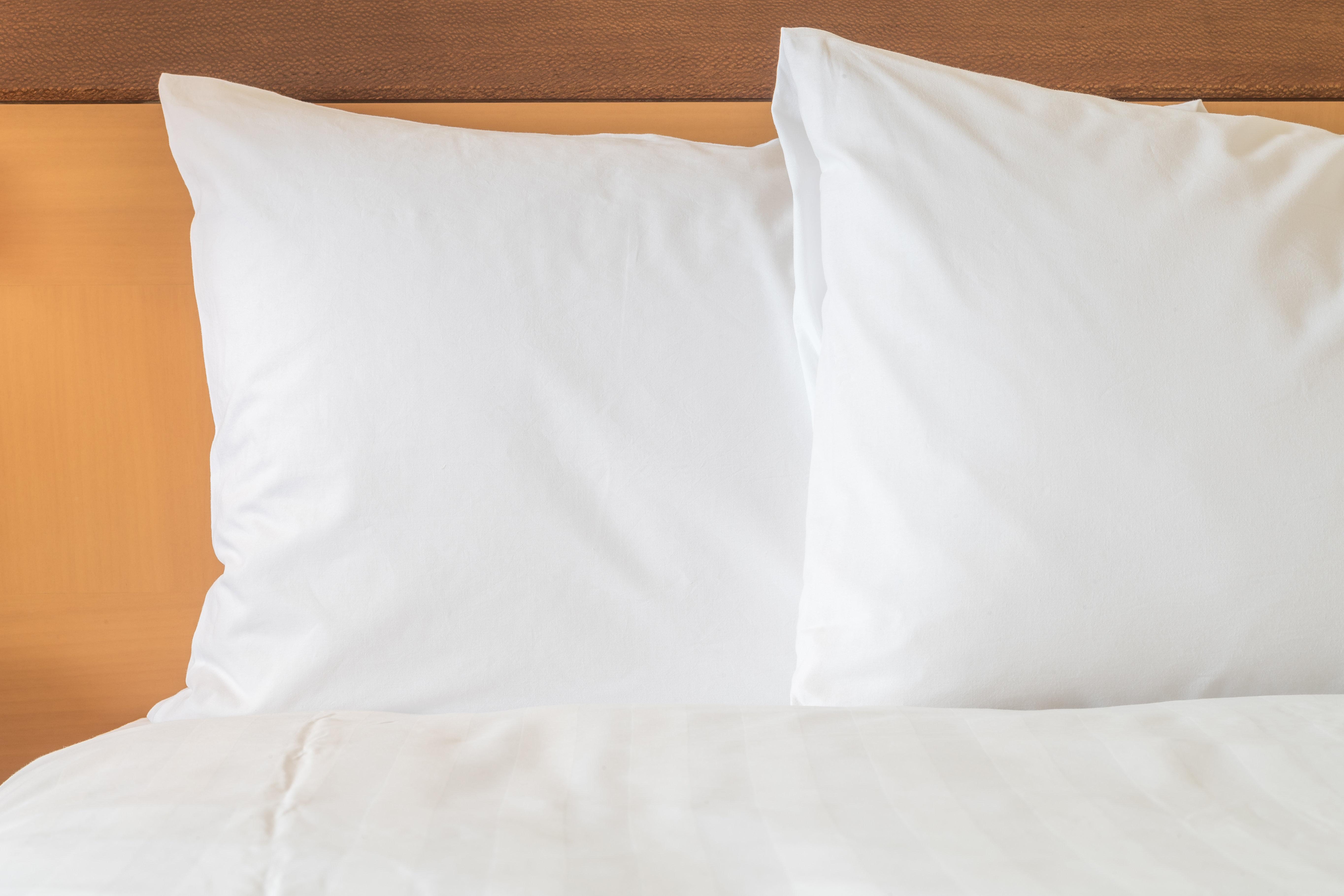 Holiday Inn Santo Domingo By Ihg Exterior foto Two pillows on a bed