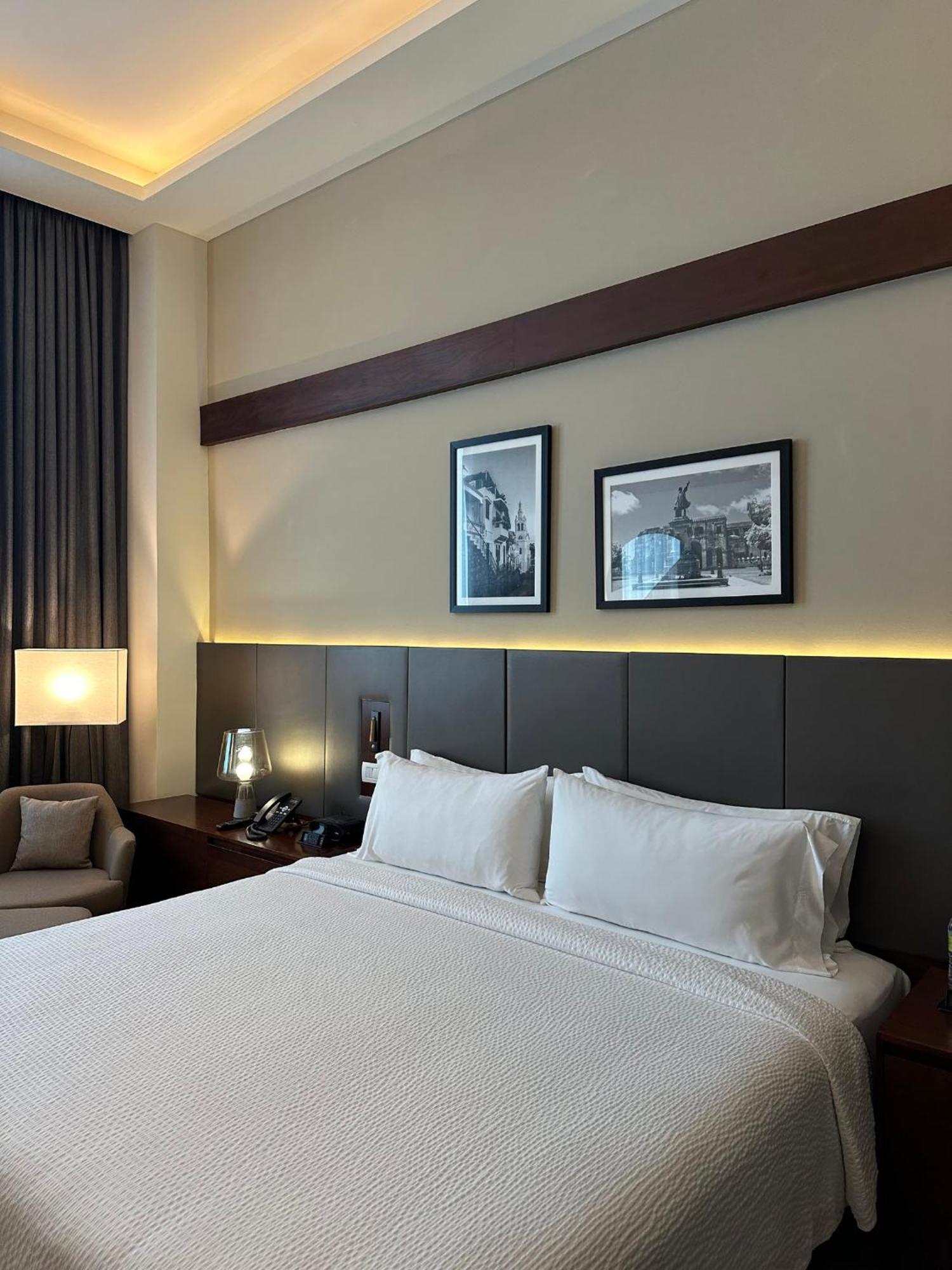 Holiday Inn Santo Domingo By Ihg Exterior foto A bedroom at the hotel